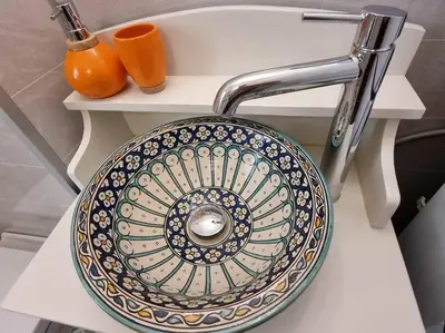 a sink with a faucet on a white counter at Solhaug in Torpo