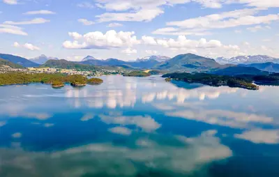 a large body of water with mountains in the background at 4 Bedroom Lovely Home In Skodje in Skodje