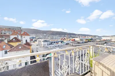 a view of a city from a balcony at Penthouse apartment in Bergen in Bergen