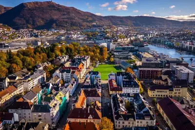 an aerial view of a city with a river and buildings at Modern apartment in the heart of Bergen in Bergen