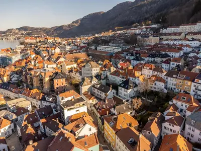 an aerial view of a city with orange roofs at Bryggen // Fløyen Apartments in Bergen
