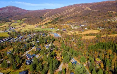 an aerial view of a village in the mountains at Nice Home In Bjorli With Wifi in Bjorli