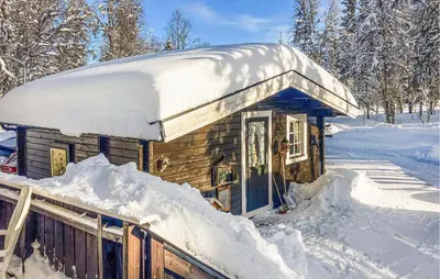 a small cabin with a snow covered roof at Nice Home In Gol With Kitchen in Golsfjellet