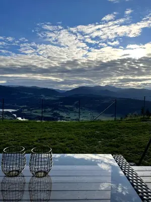 three baskets sitting on top of a table with a view at Apartment with beautiful panoramic view in Skulestadmo