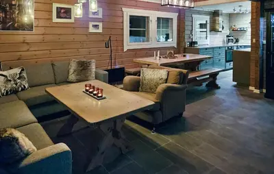 a living room with a couch and a table at Gorgeous Home In Uvdal With Wifi in Uvdal