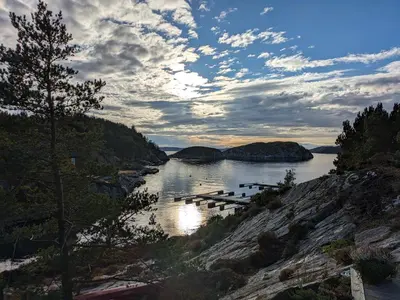 a view of a river with boats in the water at Svært nydelig fritidshytte in Forland
