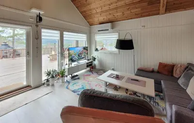 a living room with a couch and a table at Nice Home In Jelsa With Kitchen in Jelsa