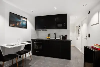 a kitchen with a sink and a counter top at Renovated 2024 - Viking inspired - Behind bryggen in Bergen
