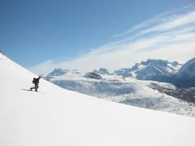 a person is skiing down a snow covered mountain at Bakkebo Trollstigen in Åndalsnes