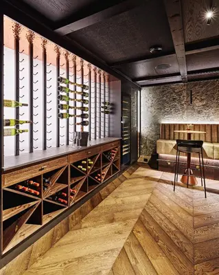 a wine tasting room with wooden wine racks at Chalet Strandafjellet in Stranda