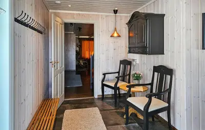 a dining room with two chairs and a table at Gorgeous Home In Rjukan With Kitchen in Rjukan