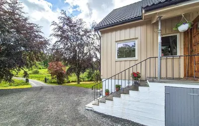 a house with a staircase on the side of it at Amazing Home In Vikebygd With Wifi in Vikebygd