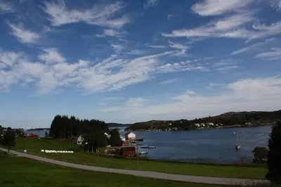 a view of a body of water with a sky at Åkviktunet hytte Sør in Averoy