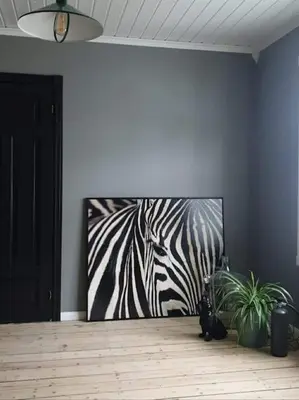 a painting of a zebra on the wall in a room at Romslig og særegent hus in Skodje