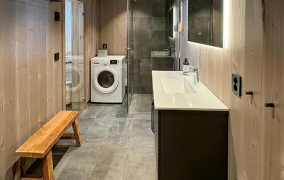 a bathroom with a washing machine and a sink at Pet Friendly Home In Gålå With Kitchen in Gålå