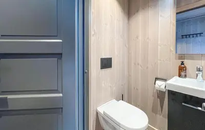 a bathroom with a toilet and a sink at Pet Friendly Home In Gålå With Kitchen in Gålå