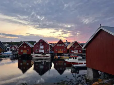 a group of houses and boats in a harbor at Rorbu i Bud Havn in Bud