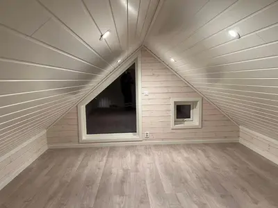 a large room with a window in a house at Rorbu i Bud Havn in Bud