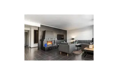 a living room with a fireplace and a couch at Pet Friendly Apartment In Hemsedal in Hemsedal