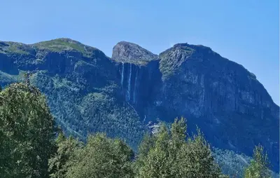 a waterfall on the side of a mountain at Pet Friendly Apartment In Hemsedal in Hemsedal
