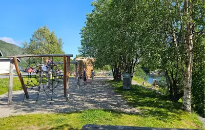 a park with a playground with people walking on it at 3 Bedroom Nice Apartment In Hemsedal in Hemsedal
