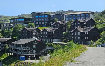 a group of houses on the side of a hill at Pet Friendly Apartment In Hemsedal in Hemsedal
