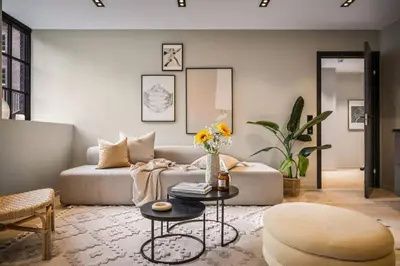 a living room with a couch and a table at Stay l Luxurious Hideaway in Centrum in Bergen