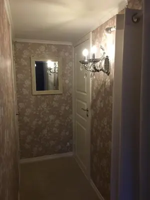 a bathroom with a walk in shower with a mirror at Villa Skoglund in Stranda