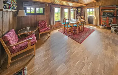 a living room with a table and chairs at Beautiful Home In Gol With Kitchen in Gol
