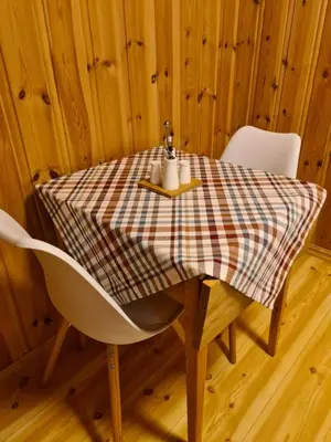 a table with a checkered table cloth on it at Hyttepreget overnattingssted in Geilo