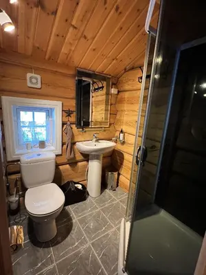a bathroom with a toilet and a sink at Geilo centrum - cozy apartment - central location in Geilo