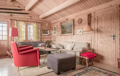 a living room with a couch and a table at 5 Bedroom Gorgeous Home In Engerdal in Nymoen