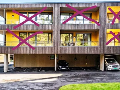 a building with pink crosses on the side of it at 4 person holiday home in Frekhaug in Hordvik