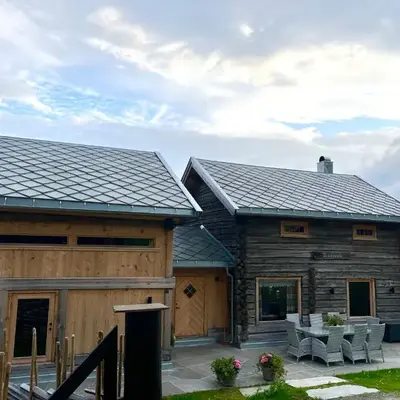 Rudland Gård - Unik gårdsovernatting i stabbur fra 1750
