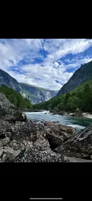a view of a river with mountains in the background at Villa Utsikten Eggen in Åndalsnes