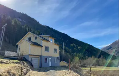 a house sitting on top of a hill at 4 Bedroom Gorgeous Home In Valldal in Valldal