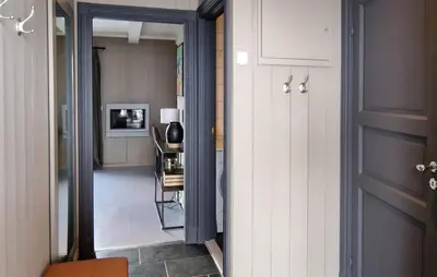 a hallway with a door leading to a living room at 2 Bedroom Stunning Home In Geilo in Geilo