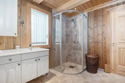 a bathroom with a shower and a sink at Trysilfjell sør 825 in Trysil