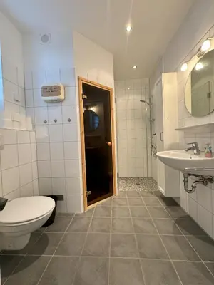 a bathroom with a toilet and a sink at Family-friendly apartment for rent at Golsfjellet in Golsfjellet