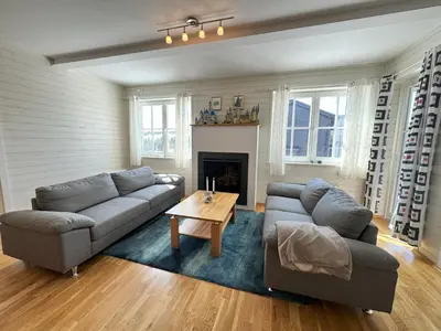 a living room with a couch and a table at Family-friendly apartment for rent at Golsfjellet in Golsfjellet