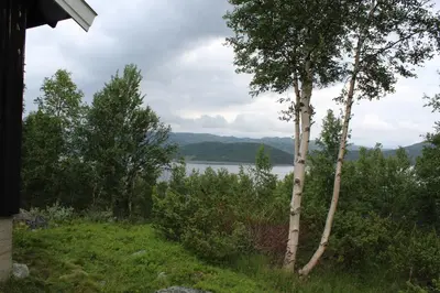 a view of a lake from a house at Jonstølen by Norgesbooking - cabin at 1020 masl in Trondsgard