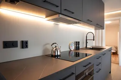 a kitchen with a tea kettle on a counter at Huset på Plassen in Sogndal