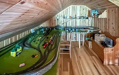 a play room with a toy train track on the wall at 3 Bedroom Stunning Home In Vossestrand in Vossestrand