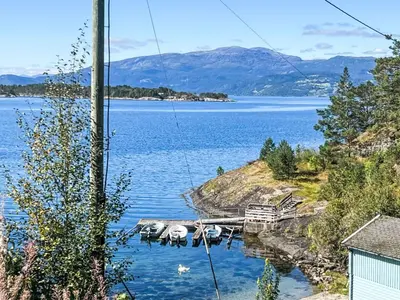 a view of a large body of water with boats at Holiday Home Blå Hytte by Interhome in Herand