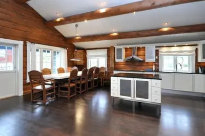 a kitchen and dining room with a table and chairs at Storsten 695 - Trysil in Trysil