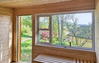 a window in a wooden room with a view at 1 Bedroom Stunning Home In Haugesund in Haugesund