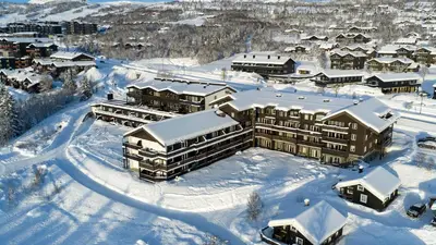 an aerial view of a resort in the snow at Central Apartment With 3 Bedrooms And Balcony in Beitostøl