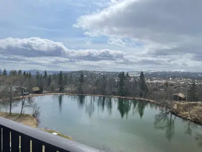 a view of a large lake on a balcony at Central Apartment With 3 Bedrooms And Balcony in Beitostøl