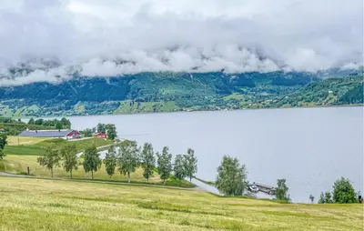 a view of a lake with at Beautiful Home In Vassenden in Vassenden