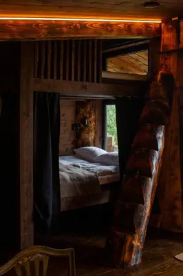 a bedroom with two bunk beds in a cabin at GapaLux in Levanger